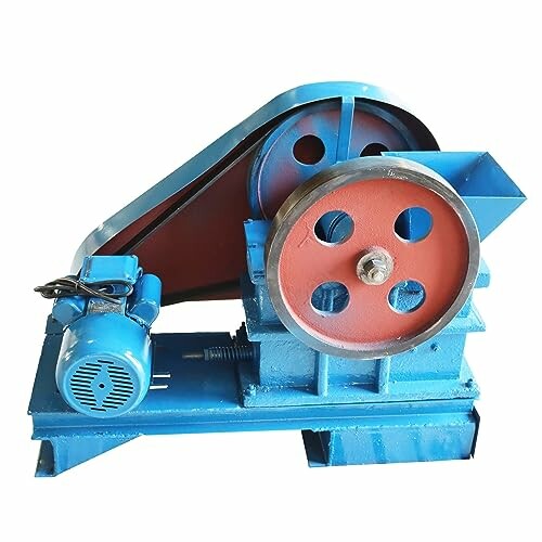 Blue industrial crushing machine with motor and pulley.